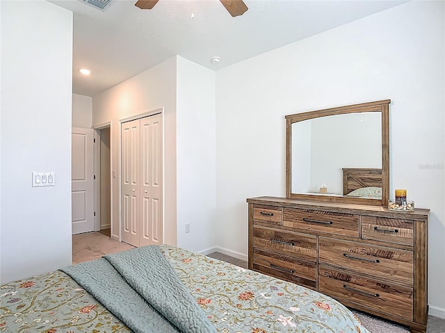 19424 SW 77th Loop, Dunnellon, FL 34432 - bedroom featuring carpet floors, a closet, and a ceiling fan