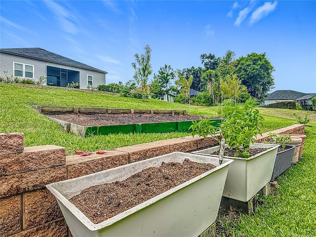 19424 SW 77th Loop, Dunnellon, FL 34432 - view of grassy yard with a vegetable garden