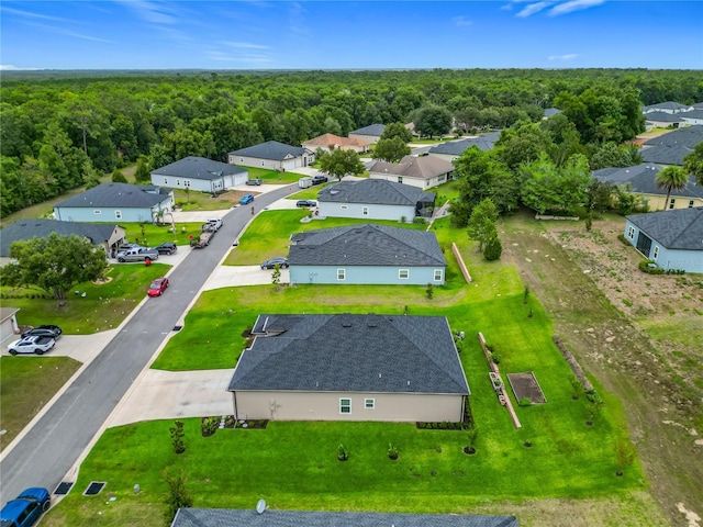 19424 SW 77th Loop, Dunnellon, FL 34432 - aerial view of residential area with a heavily wooded area