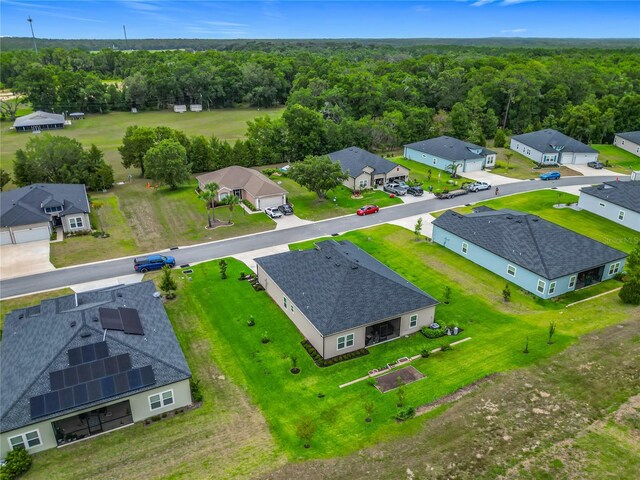 19424 SW 77th Loop, Dunnellon, FL 34432 - aerial view of residential area with a heavily wooded area