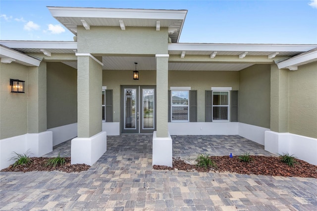 10561 SW 98th Pl, Ocala, FL 34481 - entrance to property with stucco siding and a porch