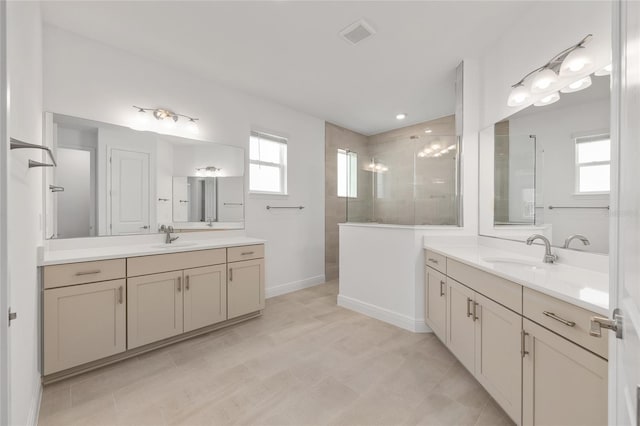 10561 SW 98th Pl, Ocala, FL 34481 - bathroom with a walk in shower, two vanities, and tile patterned flooring