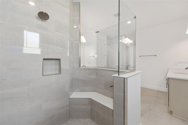 10561 SW 98th Pl, Ocala, FL 34481 - bathroom featuring walk in shower, vanity, and tile patterned flooring