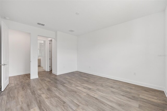 10561 SW 98th Pl, Ocala, FL 34481 - empty room with light wood finished floors and baseboards