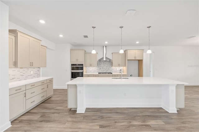 10561 SW 98th Pl, Ocala, FL 34481 - kitchen featuring stainless steel double oven, wall chimney range hood, decorative backsplash, recessed lighting, and a large island