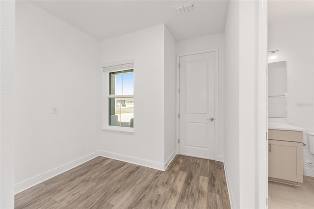 10561 SW 98th Pl, Ocala, FL 34481 - spare room with light wood finished floors and baseboards