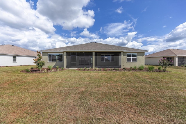 10561 SW 98th Pl, Ocala, FL 34481 - rear view of property featuring stucco siding, a lawn, and a sunroom