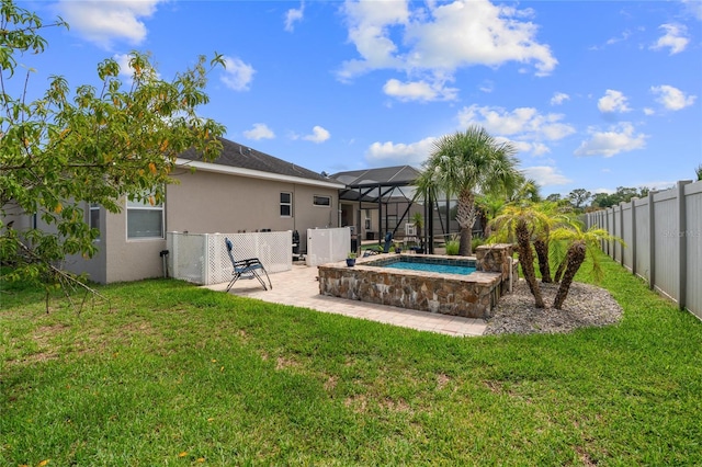 4731 SE 34th St, Ocala, FL 34480 - rear view of house with a patio, a fenced backyard, stucco siding, and glass enclosure