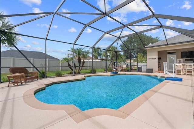 4731 SE 34th St, Ocala, FL 34480 - view of swimming pool featuring a patio, a fenced backyard, and glass enclosure