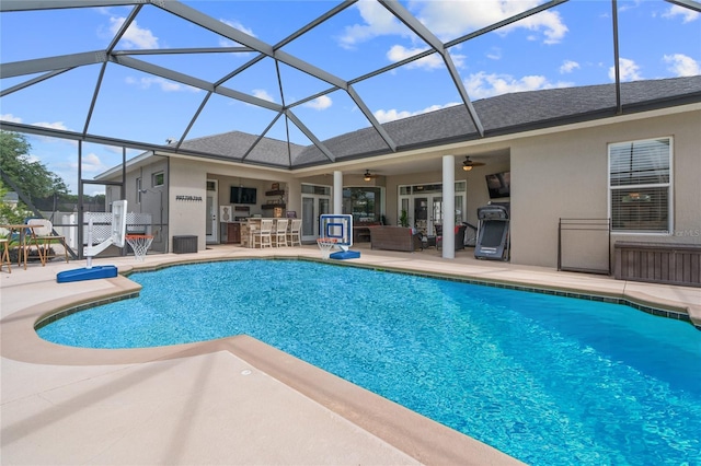 4731 SE 34th St, Ocala, FL 34480 - swimming pool with a patio, a ceiling fan, glass enclosure, and an outdoor living space