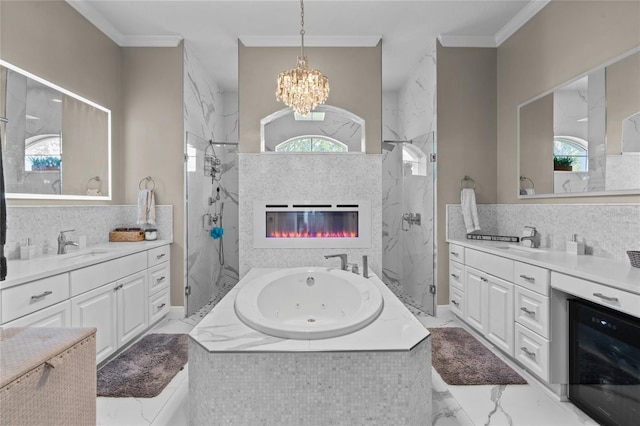 4731 SE 34th St, Ocala, FL 34480 - bathroom featuring wine cooler, a marble finish shower, two vanities, a whirlpool tub, and crown molding