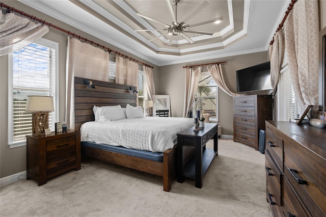 4731 SE 34th St, Ocala, FL 34480 - bedroom featuring light colored carpet, ornamental molding, a raised ceiling, and ceiling fan