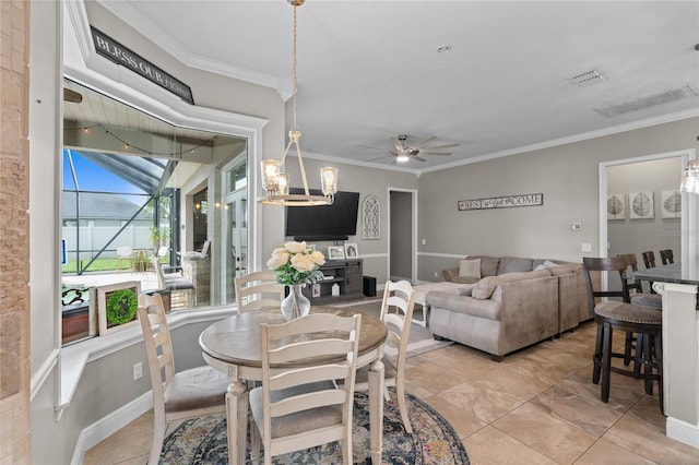 4731 SE 34th St, Ocala, FL 34480 - dining area with ceiling fan, crown molding, light tile patterned flooring, and a chandelier