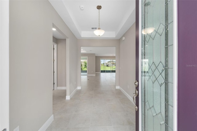 10026 SW 85th Place Rd, Ocala, FL 34481 - foyer entrance featuring light tile patterned floors and a raised ceiling