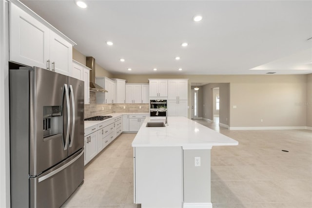 10026 SW 85th Place Rd, Ocala, FL 34481 - kitchen with appliances with stainless steel finishes, light tile patterned floors, wall chimney range hood, light countertops, and tasteful backsplash