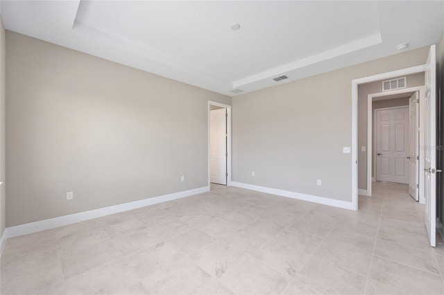10026 SW 85th Place Rd, Ocala, FL 34481 - unfurnished room featuring a tray ceiling and baseboards
