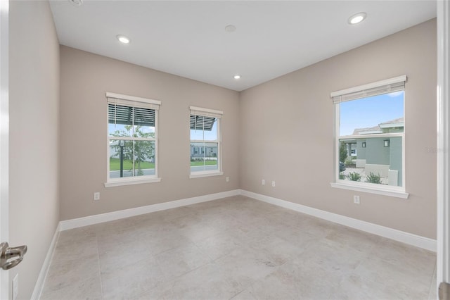 10026 SW 85th Place Rd, Ocala, FL 34481 - spare room with recessed lighting