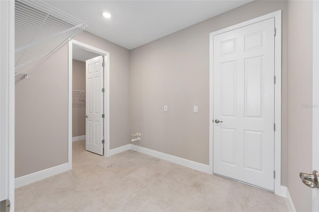 10026 SW 85th Place Rd, Ocala, FL 34481 - unfurnished bedroom featuring a spacious closet, recessed lighting, and a closet
