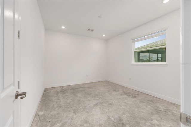 10026 SW 85th Place Rd, Ocala, FL 34481 - unfurnished room with concrete floors and recessed lighting