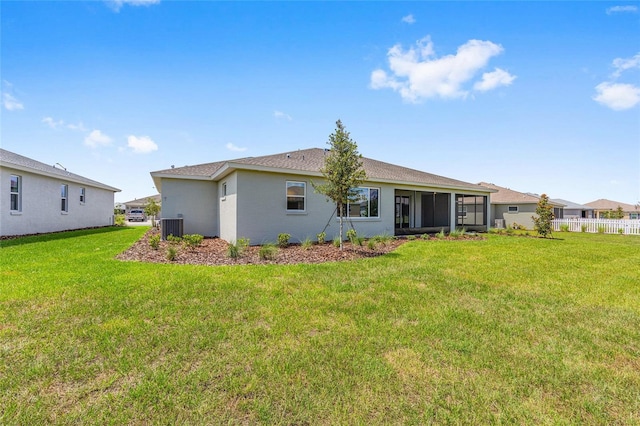 10026 SW 85th Place Rd, Ocala, FL 34481 - back of property featuring a sunroom and stucco siding