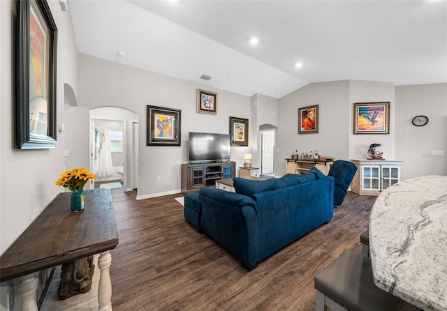 11330 SW 61st Cir, Ocala, FL 34476 - living area featuring arched walkways, lofted ceiling, and dark wood finished floors