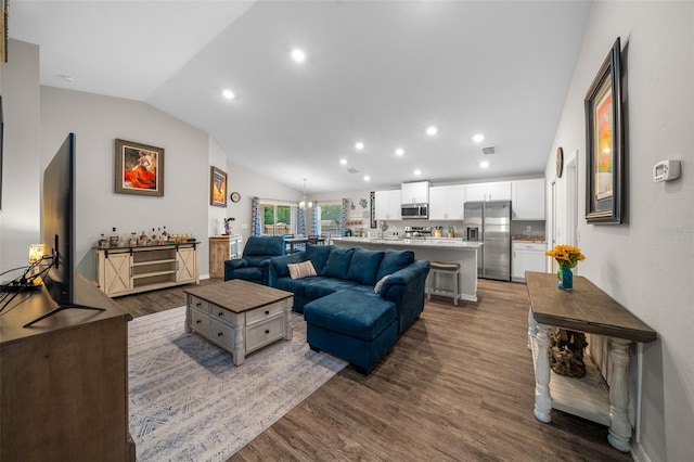 11330 SW 61st Cir, Ocala, FL 34476 - living room featuring lofted ceiling, dark wood-style flooring, and recessed lighting