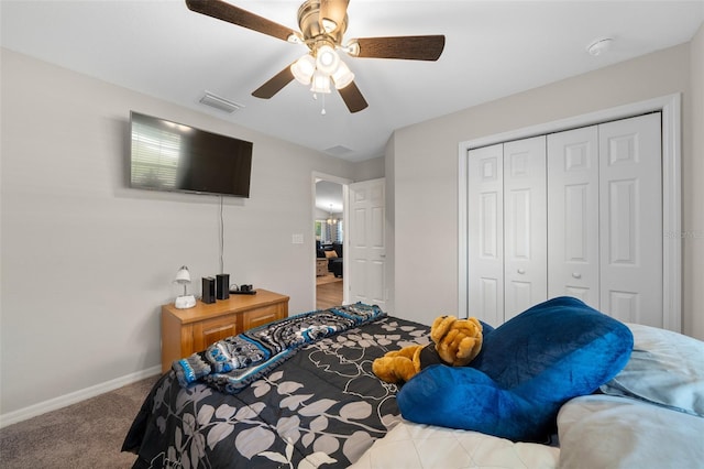 11330 SW 61st Cir, Ocala, FL 34476 - bedroom with carpet, a closet, and ceiling fan