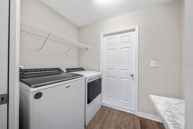 11330 SW 61st Cir, Ocala, FL 34476 - laundry room with washing machine and clothes dryer and dark wood-style floors