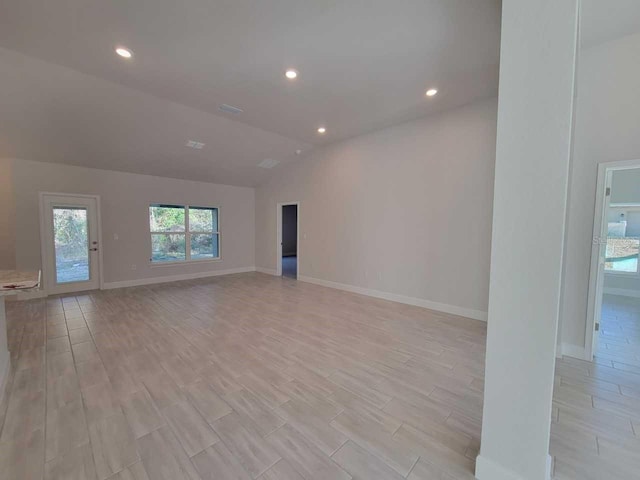 12384 SW 96th Ln, Dunnellon, FL 34432 - unfurnished room featuring light wood-style flooring, recessed lighting, and vaulted ceiling