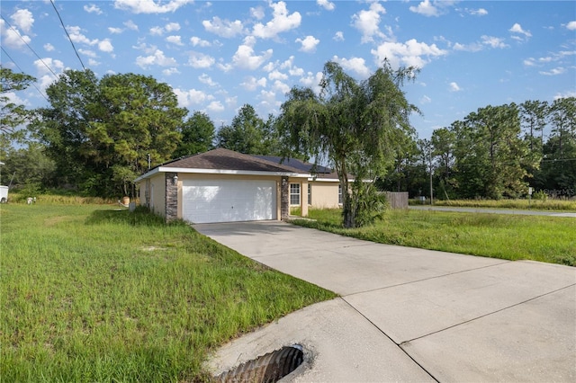 51 Pine Trace Loop, Ocala, FL 34472 - ranch-style house featuring driveway, a front yard, and a garage