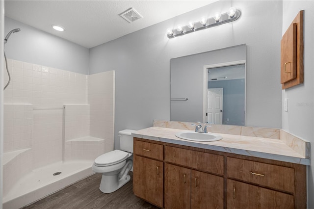 51 Pine Trace Loop, Ocala, FL 34472 - full bathroom with wood finished floors, a tile shower, and vanity