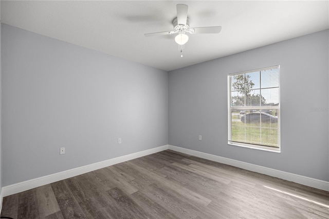 51 Pine Trace Loop, Ocala, FL 34472 - spare room with dark wood-style floors and ceiling fan
