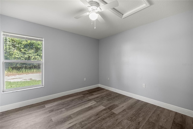 51 Pine Trace Loop, Ocala, FL 34472 - empty room with attic access, dark wood-style flooring, and a ceiling fan