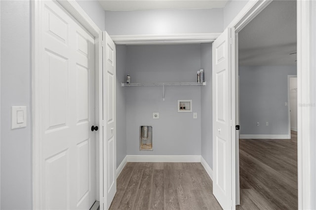 51 Pine Trace Loop, Ocala, FL 34472 - washroom featuring hookup for a washing machine, wood finished floors, and electric dryer hookup
