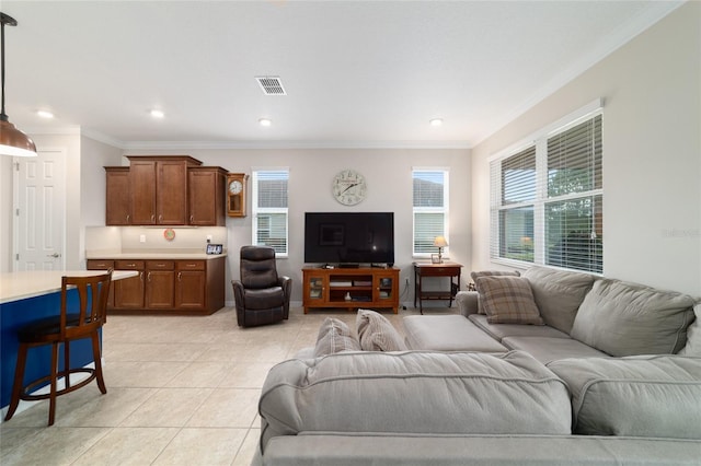 9236 SW 91st Court Rd, Ocala, FL 34481 - living room with light tile patterned floors, ornamental molding, and recessed lighting