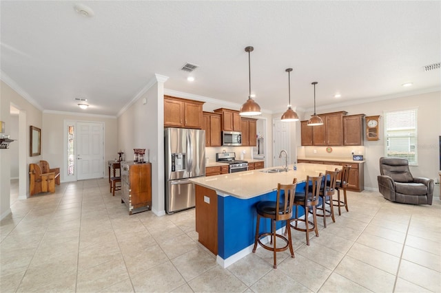 9236 SW 91st Court Rd, Ocala, FL 34481 - kitchen with stainless steel appliances, ornamental molding, a kitchen breakfast bar, brown cabinetry, and light tile patterned floors