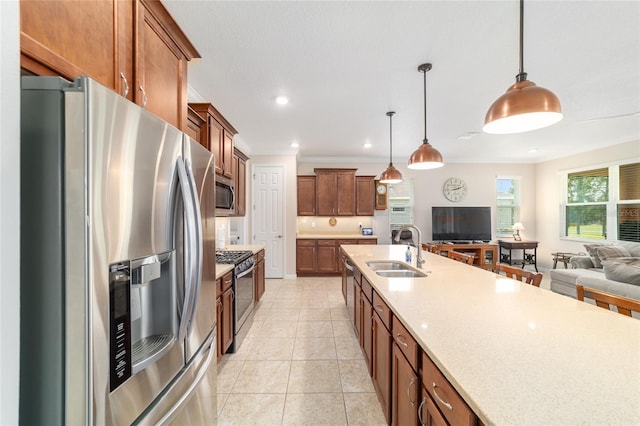 9236 SW 91st Court Rd, Ocala, FL 34481 - kitchen featuring stainless steel appliances, open floor plan, hanging light fixtures, light tile patterned flooring, and recessed lighting