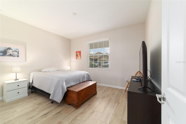 9236 SW 91st Court Rd, Ocala, FL 34481 - bedroom with light wood-style floors and baseboards