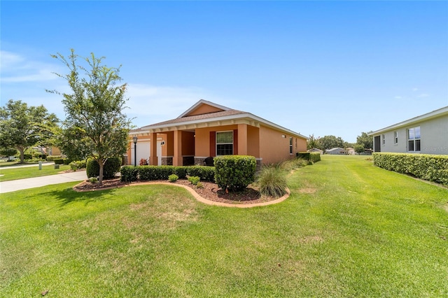 9236 SW 91st Court Rd, Ocala, FL 34481 - view of front of property featuring a garage, concrete driveway, a front yard, and stucco siding