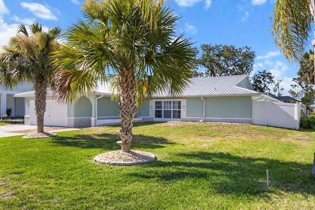1860 NW 16th St, Crystal River, FL 34428 - view of front of home featuring stucco siding, a metal roof, and driveway