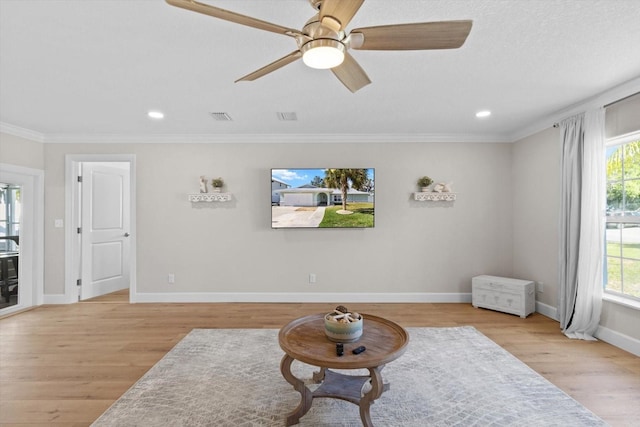1860 NW 16th St, Crystal River, FL 34428 - living area with ornamental molding, wood finished floors, recessed lighting, and ceiling fan