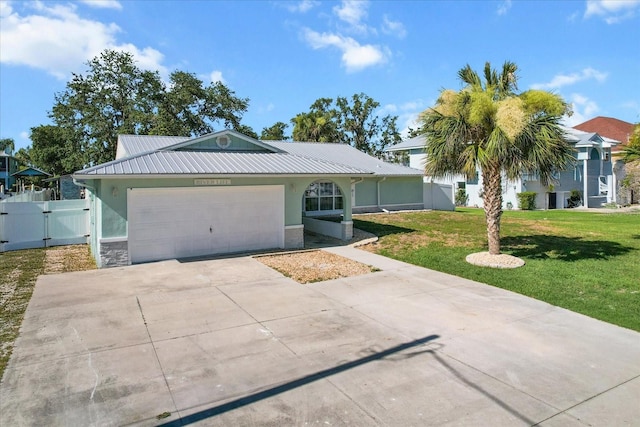 1860 NW 16th St, Crystal River, FL 34428 - ranch-style house featuring a gate, an attached garage, stucco siding, driveway, and a metal roof