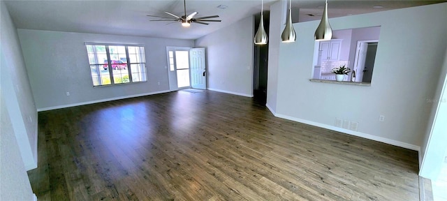 8771 SW 115th St, Ocala, FL 34481 - empty room with lofted ceiling, dark wood-type flooring, and a ceiling fan