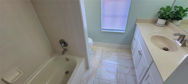 8771 SW 115th St, Ocala, FL 34481 - full bathroom featuring vanity, marble look tile flooring, and shower / washtub combination