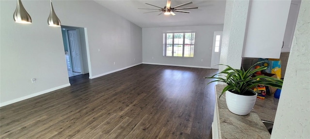 8771 SW 115th St, Ocala, FL 34481 - unfurnished living room with lofted ceiling, dark wood-type flooring, and ceiling fan