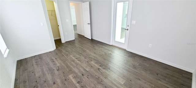 8771 SW 115th St, Ocala, FL 34481 - empty room with wood finished floors and baseboards