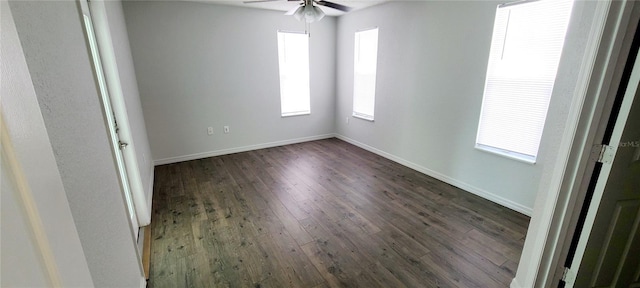 8771 SW 115th St, Ocala, FL 34481 - spare room with ceiling fan and dark wood-type flooring