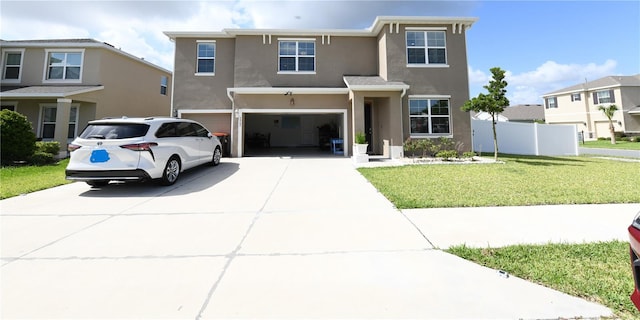 5962 SW 80th Ln, Ocala, FL 34476 - traditional home featuring an attached garage, stucco siding, and driveway