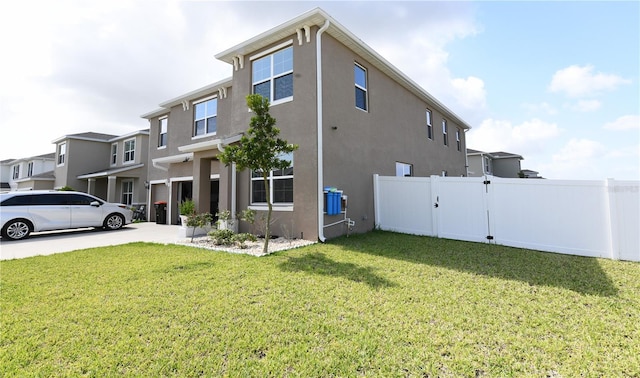 5962 SW 80th Ln, Ocala, FL 34476 - view of side of property with stucco siding and a gate