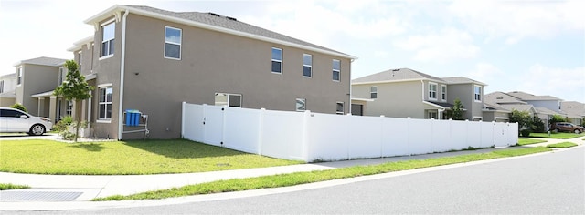 5962 SW 80th Ln, Ocala, FL 34476 - view of home's exterior featuring stucco siding and a residential view